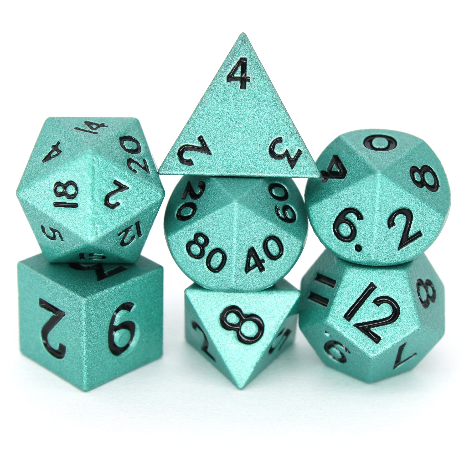 Swabbies is a 7-piece set of shimmering, turquoise colored 10mm metal dice.