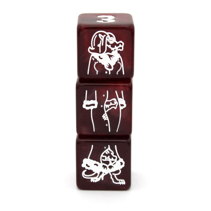 Three Kobolds is a 9-piece swirled&nbsp;red resin set engraved with articles of clothing inked in bright white. Included are 3 d6 that form a totally normal dragonborn in a wig and winter coat.