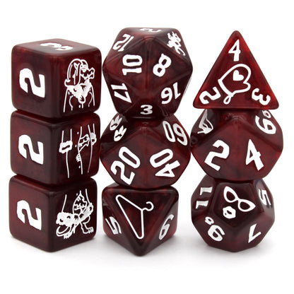 Three Kobolds is a 9-piece swirled&nbsp;red resin set engraved with articles of clothing inked in bright white. Included are 3 d6 that form a totally normal dragonborn in a wig and winter coat.