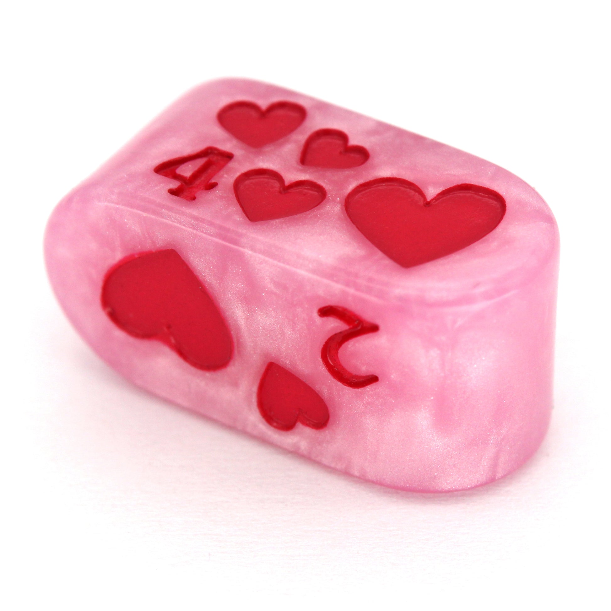 Toon Hearts - Tyranny are pearly pink Dice Envy Original Infinity d4s inked in demonic fuchsia. Each one measures 12mm x 24mm.