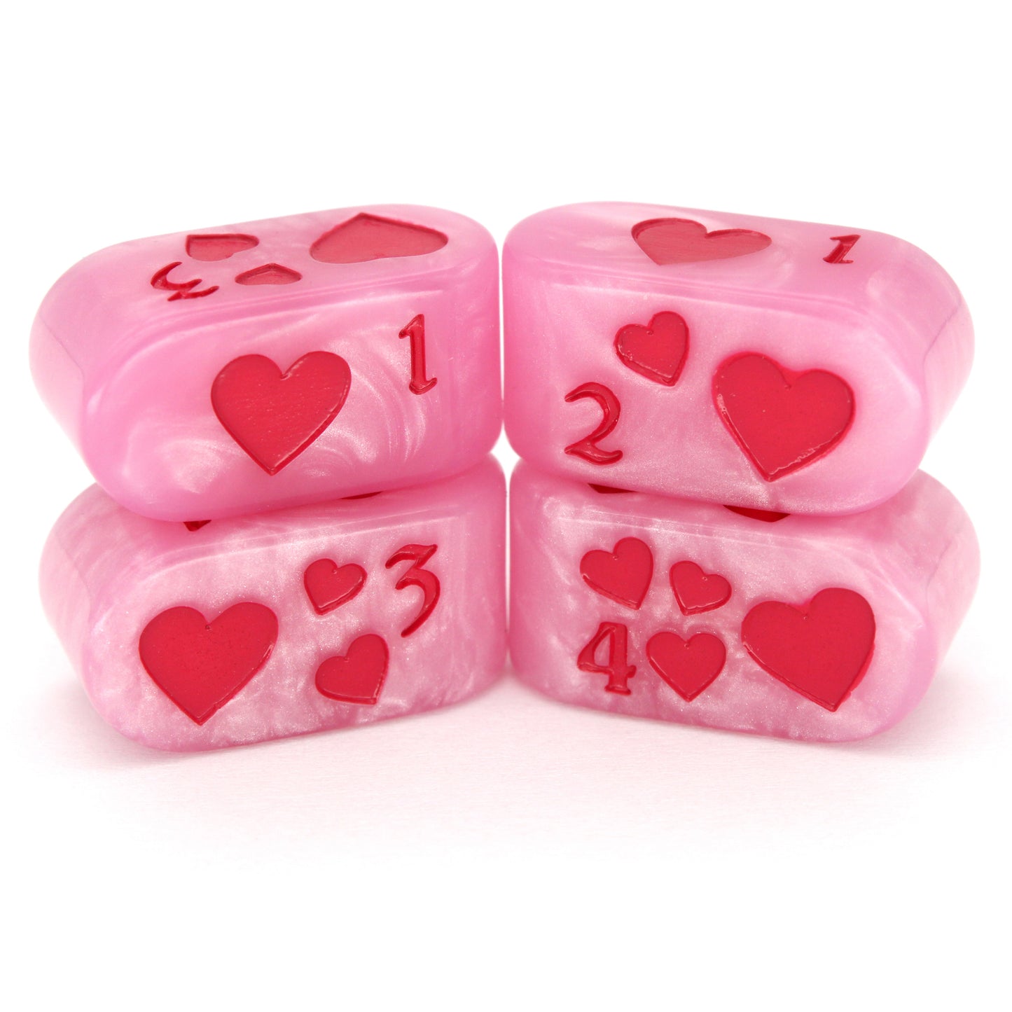 Toon Hearts - Tyranny are pearly pink Dice Envy Original Infinity d4s inked in demonic fuchsia. Each one measures 12mm x 24mm.