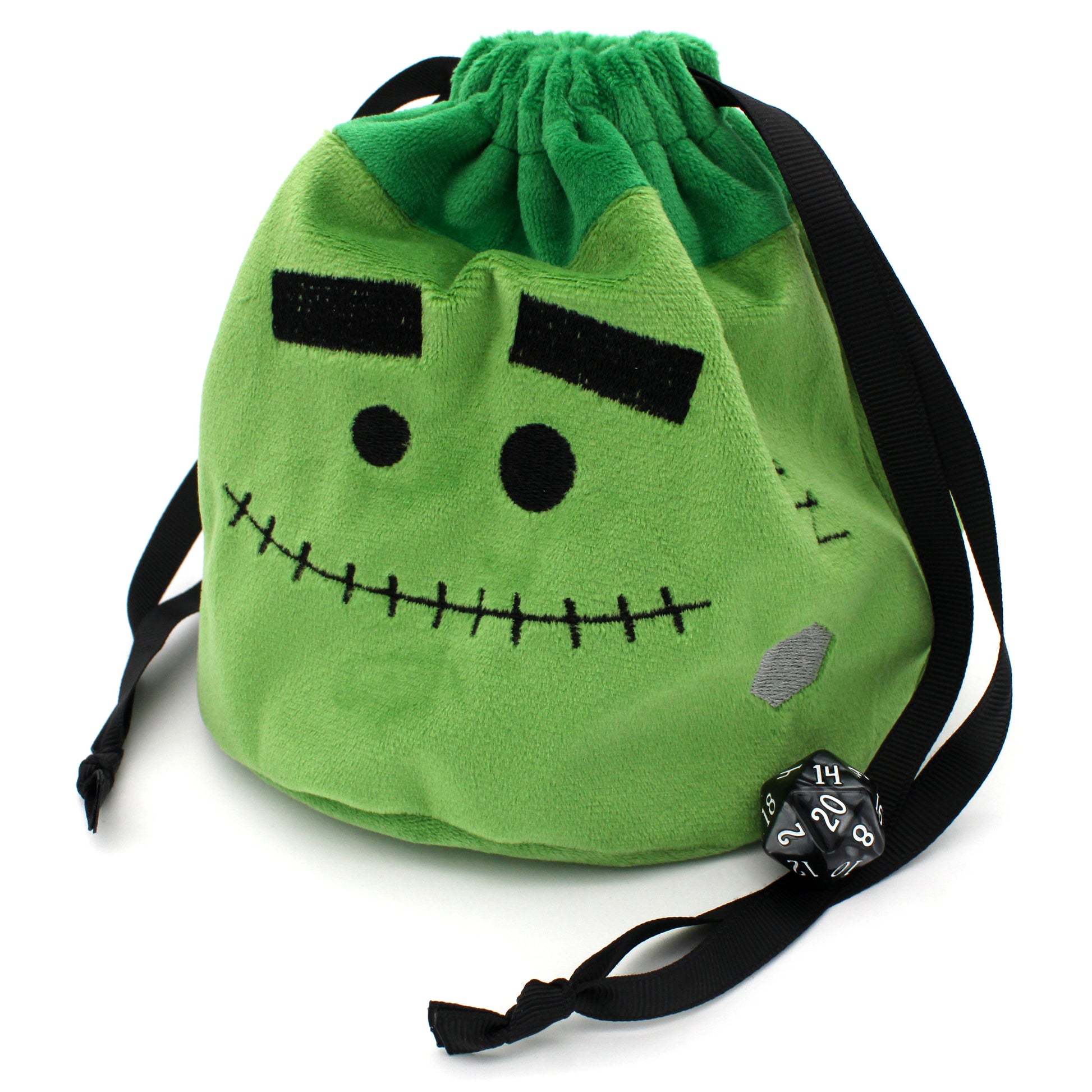 Each Trick or Treat Mystery Bag contains a selection of spooky delights, including 3 full sets of dice, as well as an assortment of goodies, all held in a plush Franken-pouch.