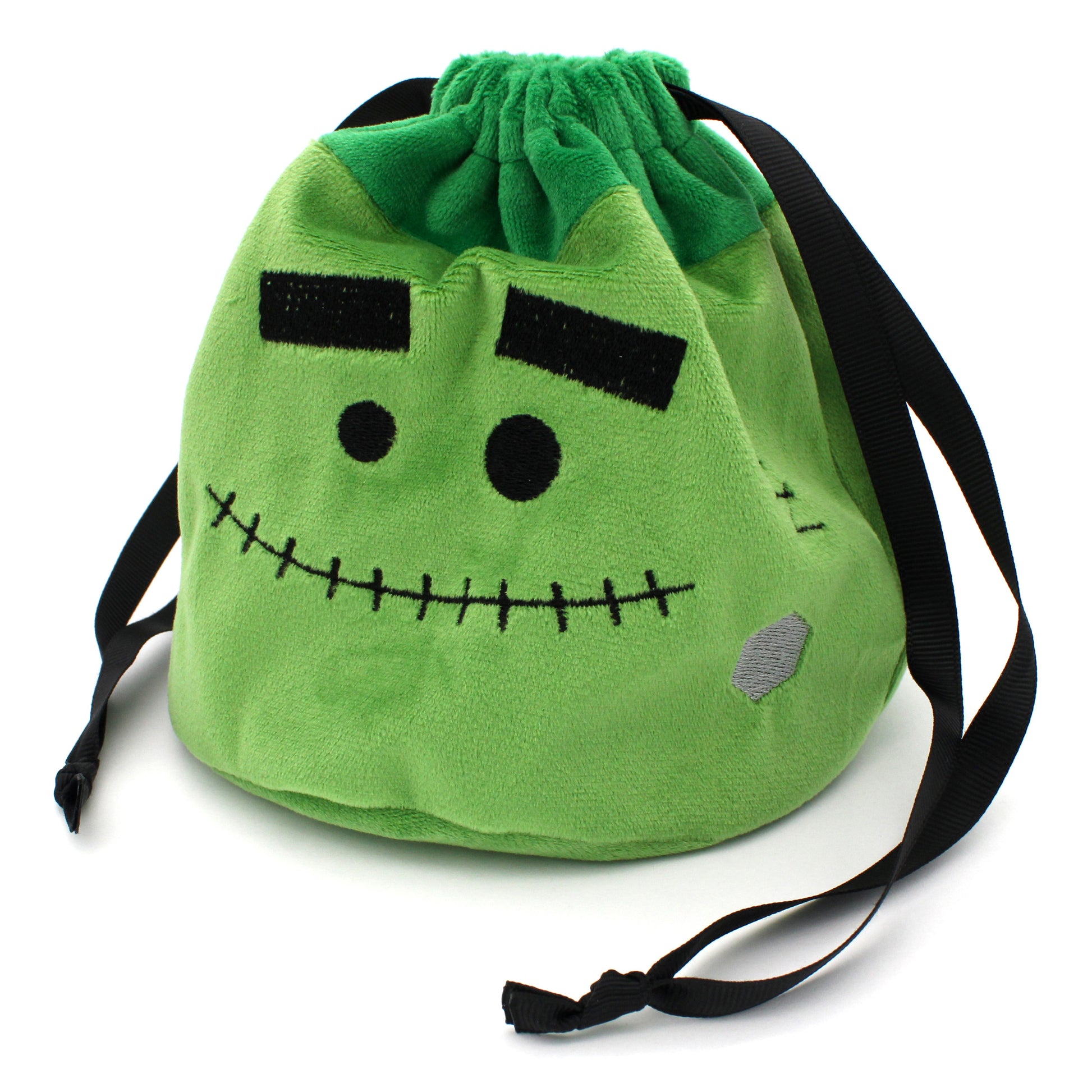 Each Trick or Treat Mystery Bag contains a selection of spooky delights, including 3 full sets of dice, as well as an assortment of goodies, all held in a plush Franken-pouch.