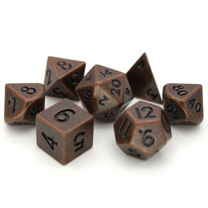 Urchins is a 7-piece set of ancient copper colored 10mm metal dice.