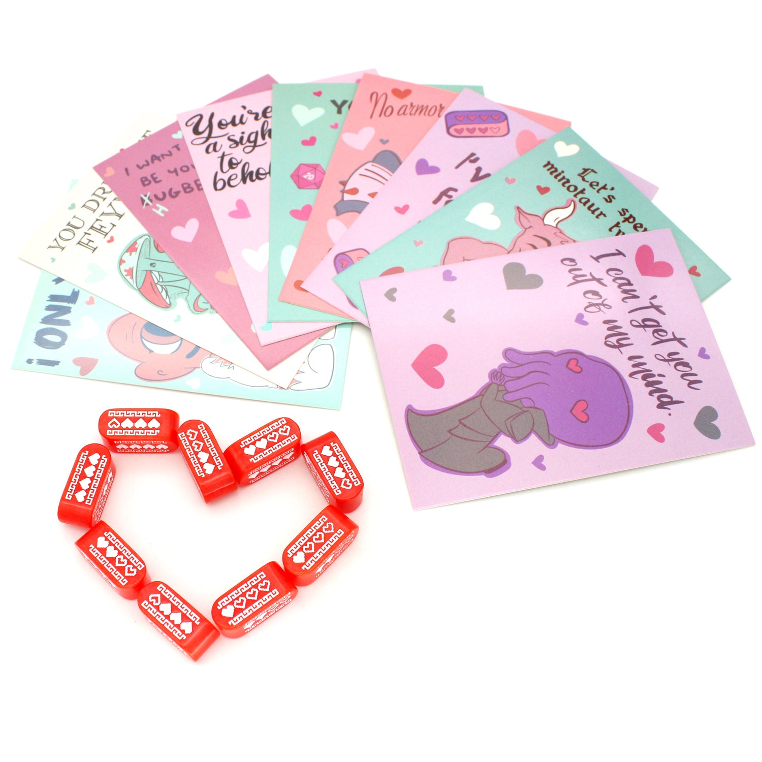 Each box of Valentines contains nine tabletop-themed cards, nine red Infinity d4s with our Pixel Heart design in white ink, as well as nine adhesives to affix the dice to the cards, all held in a pink printed package.