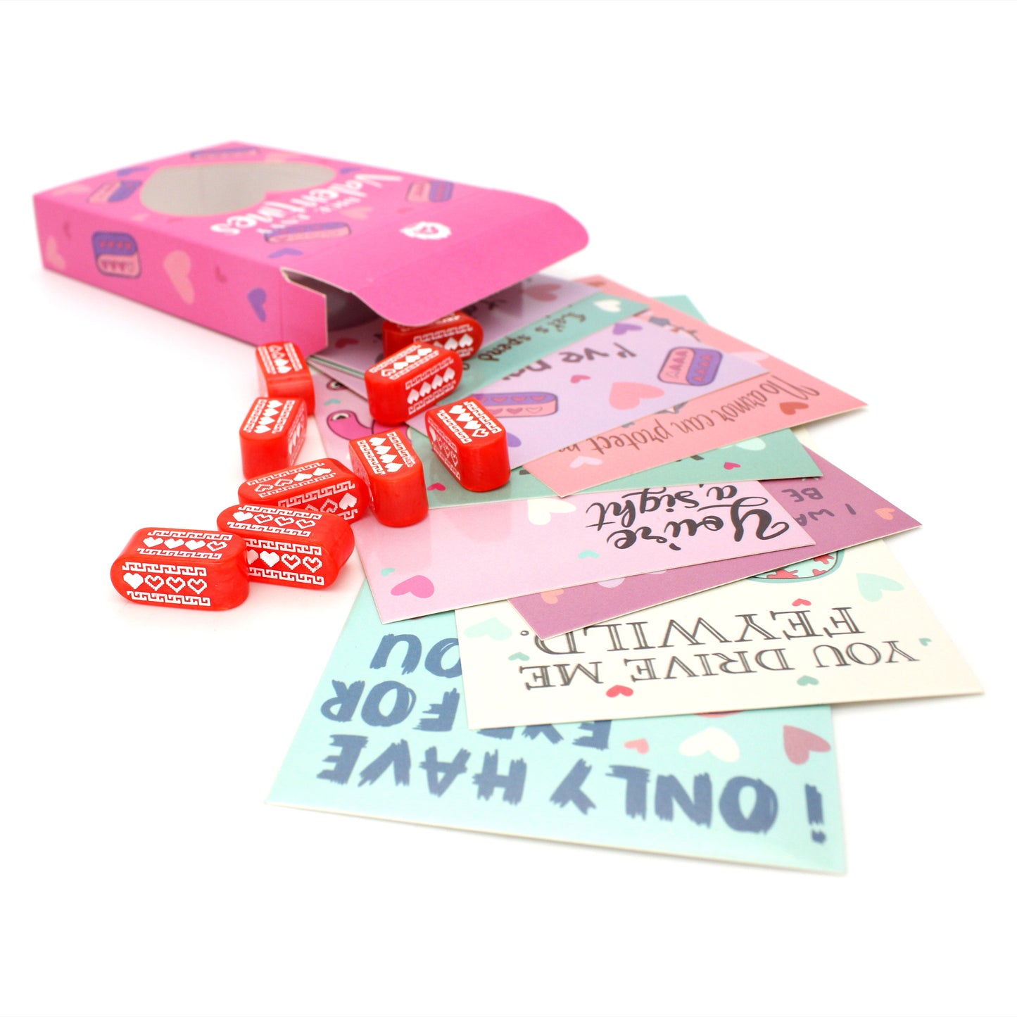 Each box of Valentines contains nine tabletop-themed cards, nine red Infinity d4s with our Pixel Heart design in white ink, as well as nine adhesives to affix the dice to the cards, all held in a pink printed package.