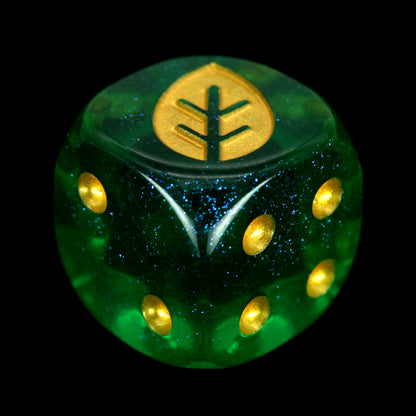 War Growth (Kelp) is a 10-piece set of 16mm acrylic d6s in transparent green, filled with glistening blue glitter, with pips and leaf engraving in gold ink.