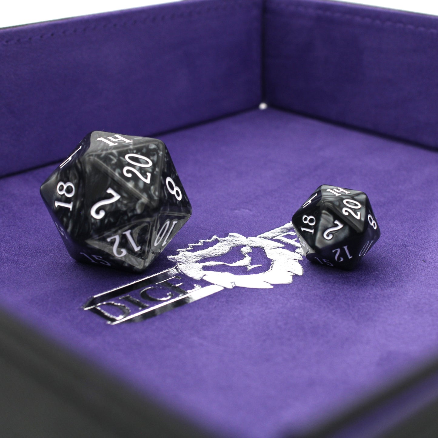 Made of vegan leather and microsuede, our dice trays have hidden magnets that hold them together and are available in druid green, warlock purple, barbarian tan, cleric blue, rogue red, and necromancer black.