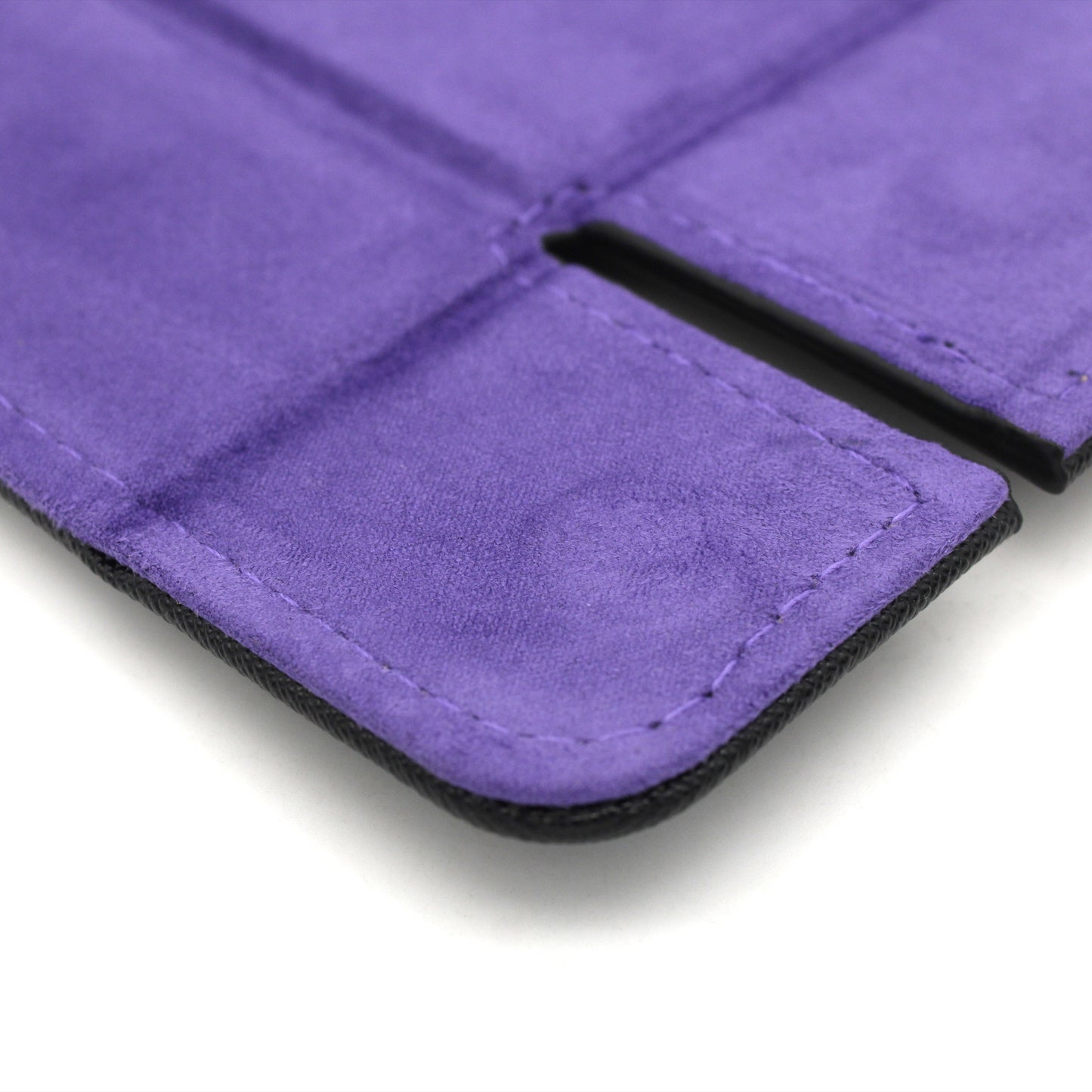 Made of vegan leather and microsuede, our dice trays have hidden magnets that hold them together and are available in druid green, warlock purple, barbarian tan, cleric blue, rogue red, and necromancer black.