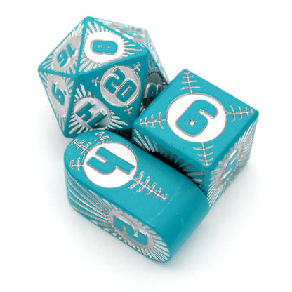 Warp Speed Delta is an 8-piece Dice Envy Exclusive metal set in matte teal with silver ink, featuring our original Alpha design, brought to you for the first time in metal!