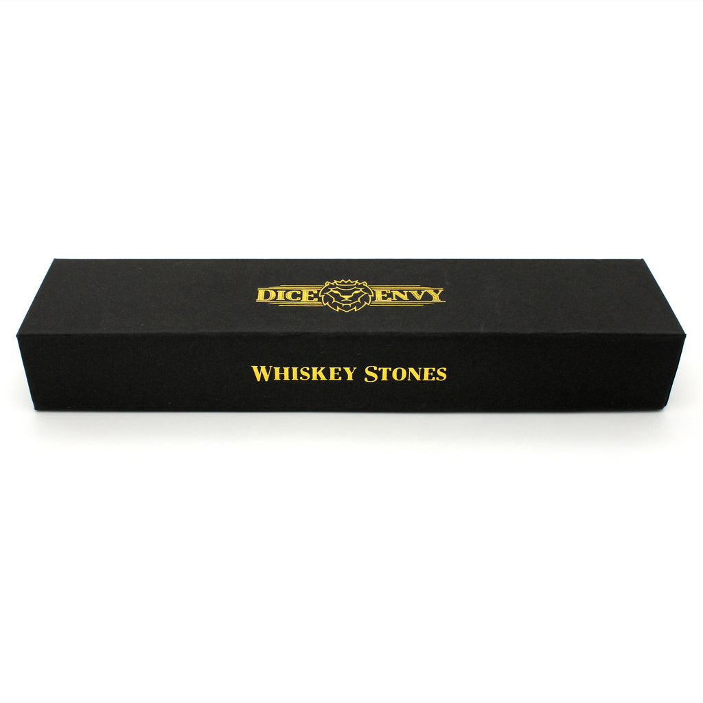 Whiskey Stones are a 7-piece soapstone set inked in black and coated with food-safe sealant. Place in the freezer for at least one hour, then use in a glass with whiskey (or beverage of your choice). Please do not eat/swallow the dice.