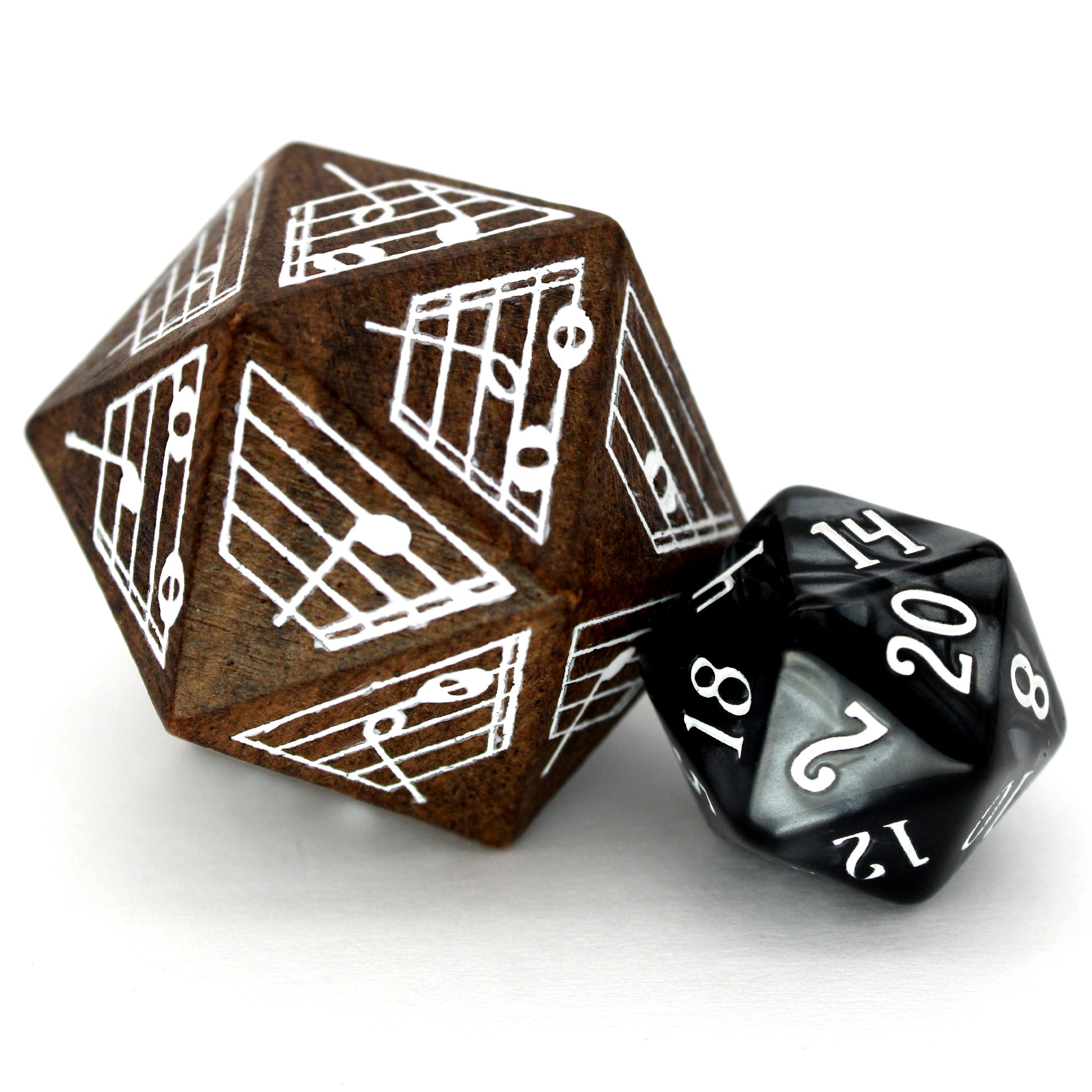 Ebony d20 with music notes and regular d20