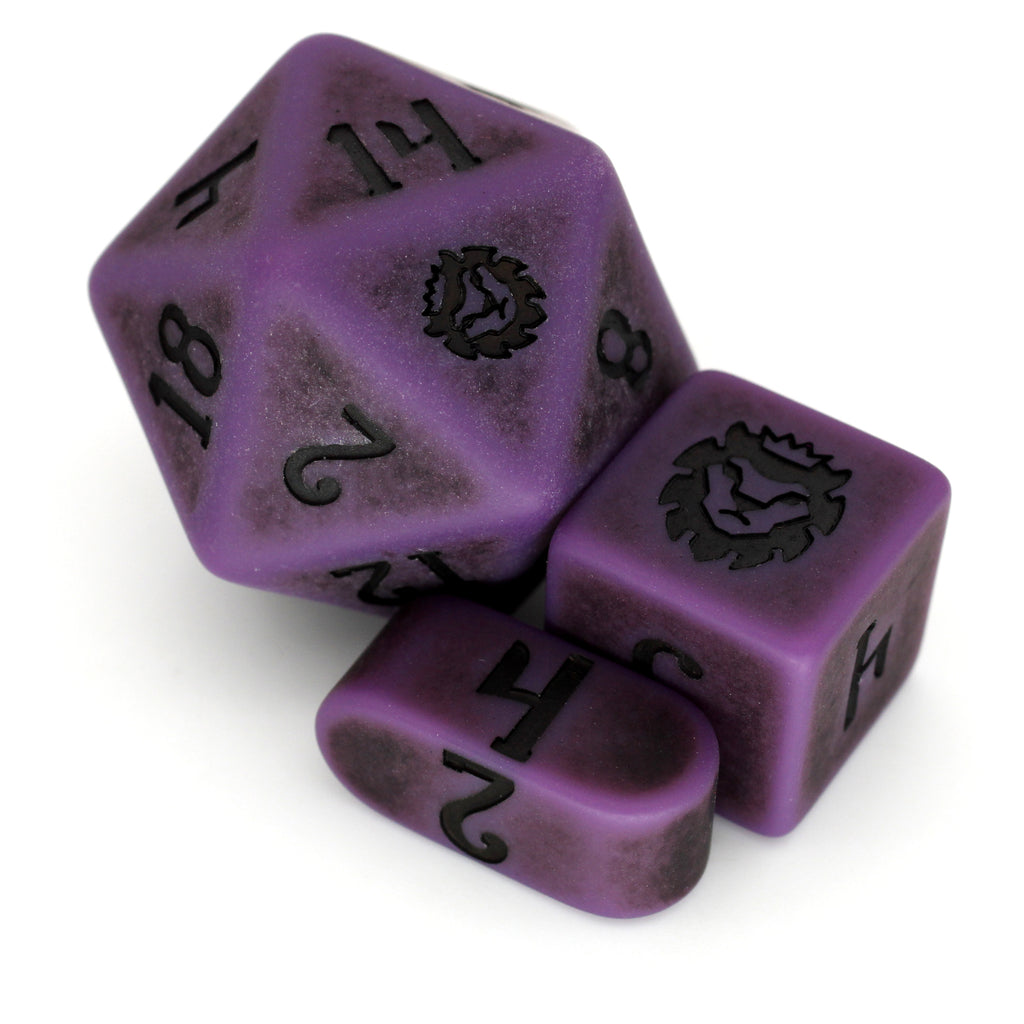 Worm Poison is a 10-piece set of wormy purple resin dice with a matte powder finish and black inking.