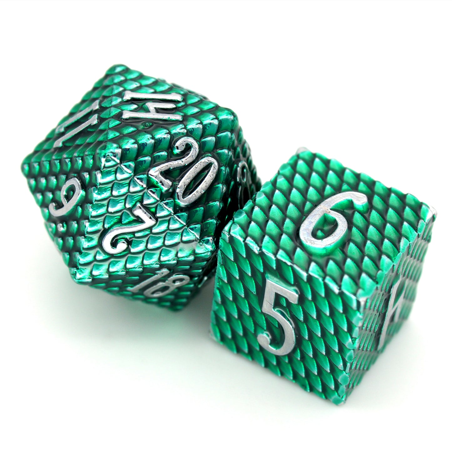 Wyvern is a 7-piece emerald green scaled metal set with cool silver numbering.