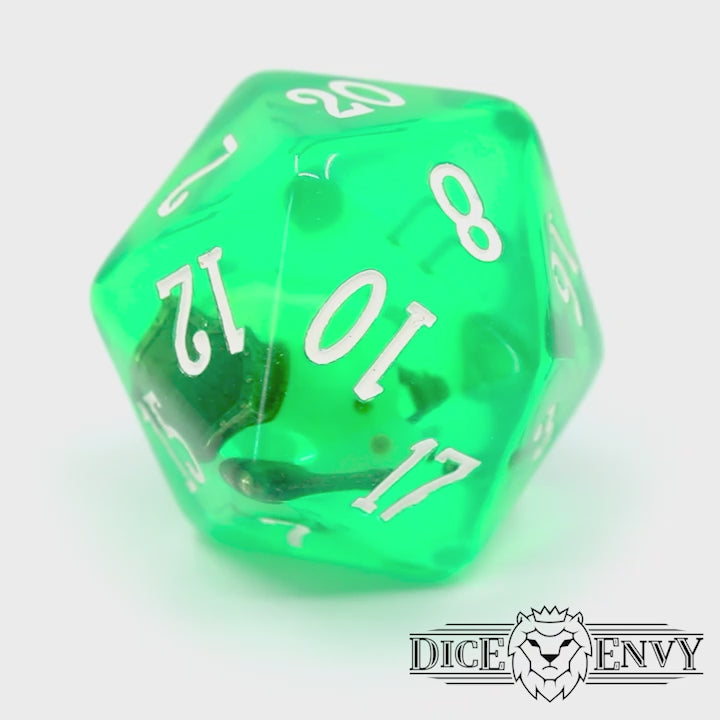 Gelatinous Icosahedrons are translucent resin d20s containing skull, bone, and weapon inclusions.
