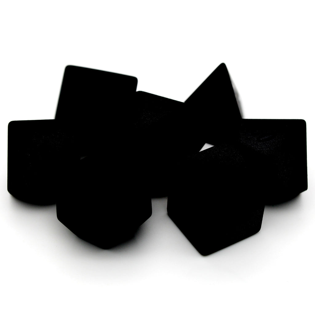 A mysterious silhouette of a premium material dice set.