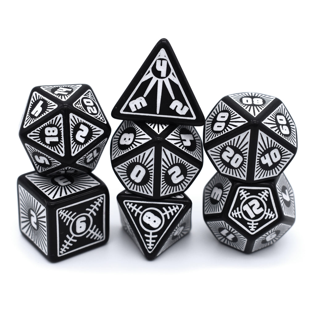 Alpha is a 7-piece engraved black resin set inked in bright white.