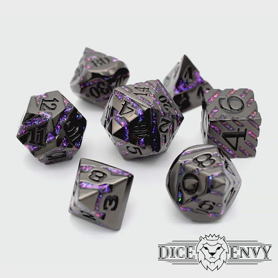 Arcane Vein is an 8-piece black metal set banded in a wraparound enamel fill of shimmering purple.