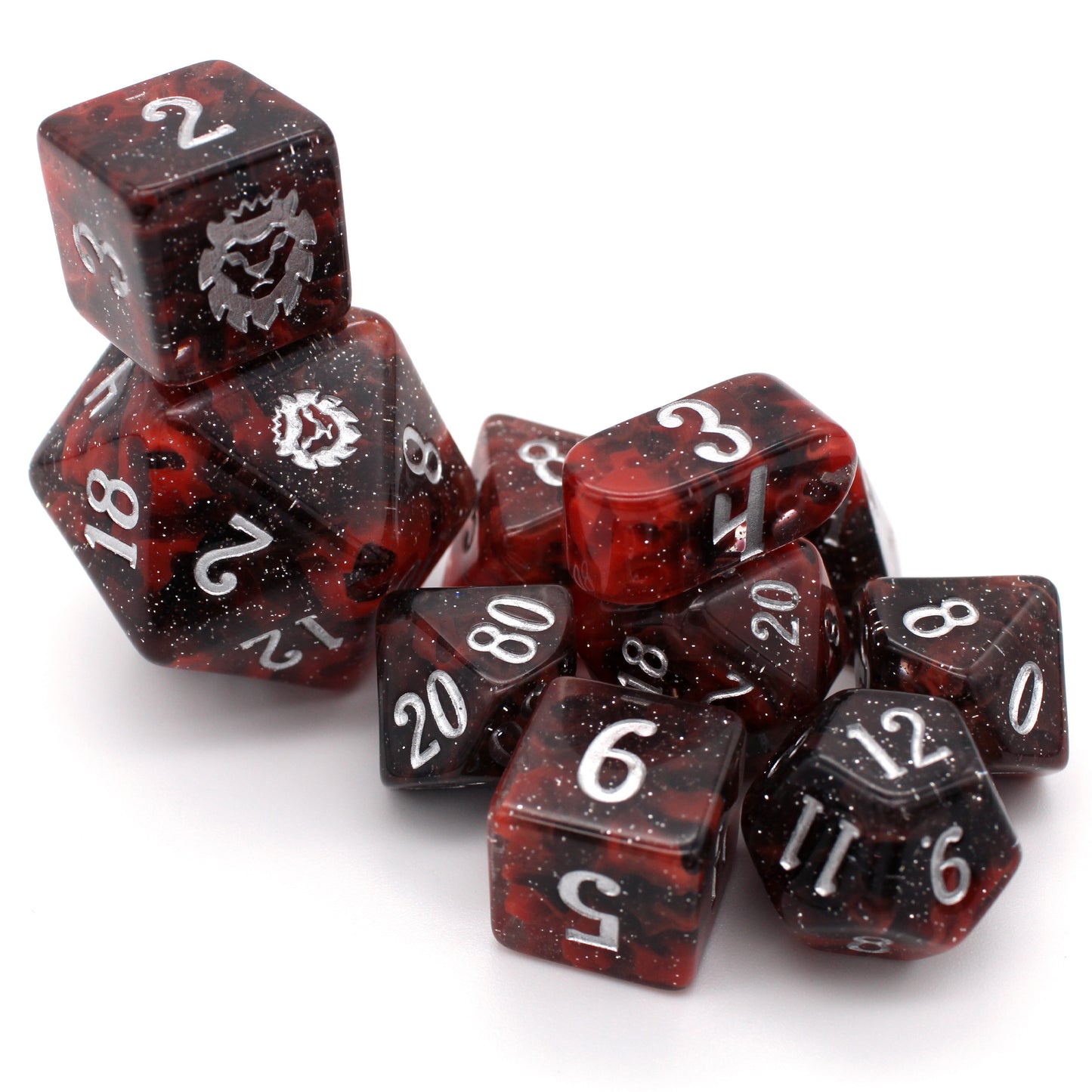 Carina Nebula is a marvel of astronomical beauty with swirls of opaque red and glittery translucent black resin that give amazing depth and unique patterning to each set of silver inked dice!