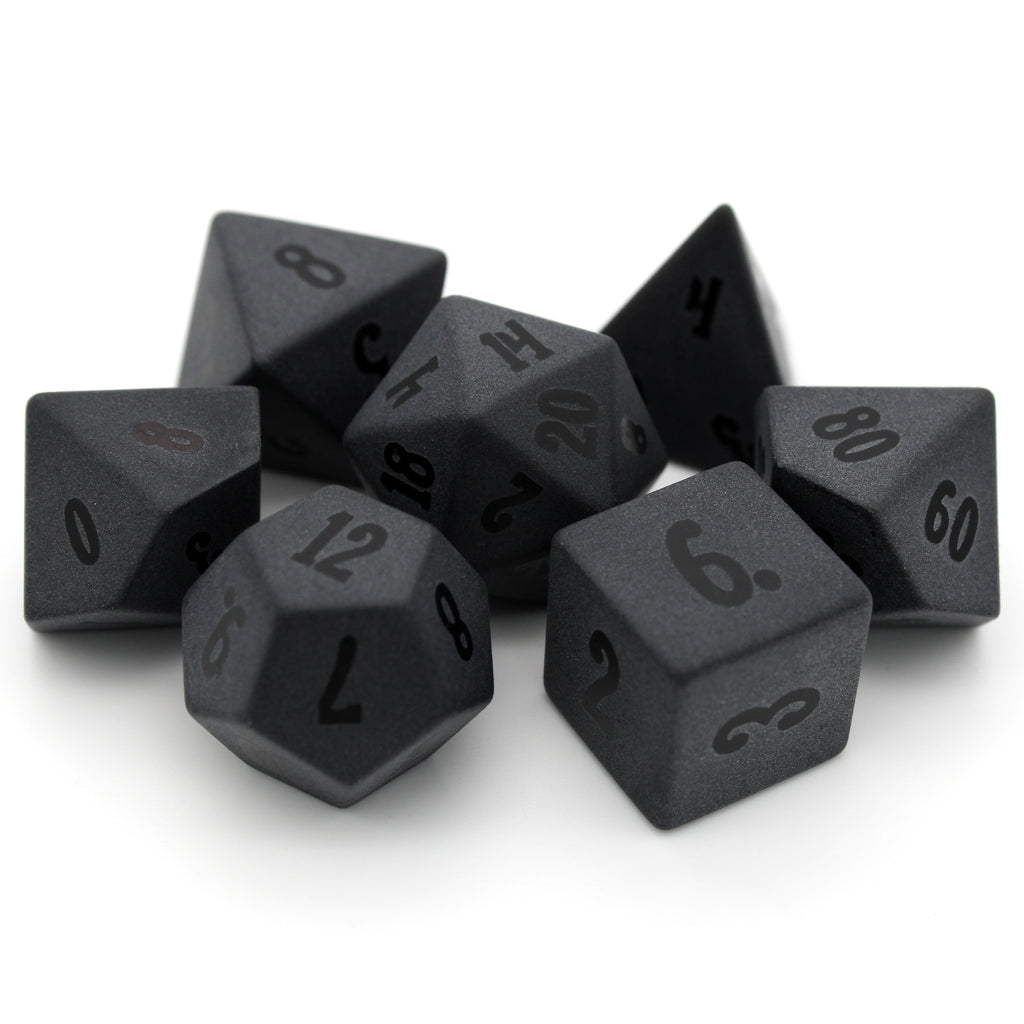 Corruption is a 7-piece frosted obsidian dice set with smoothly etched numbers.