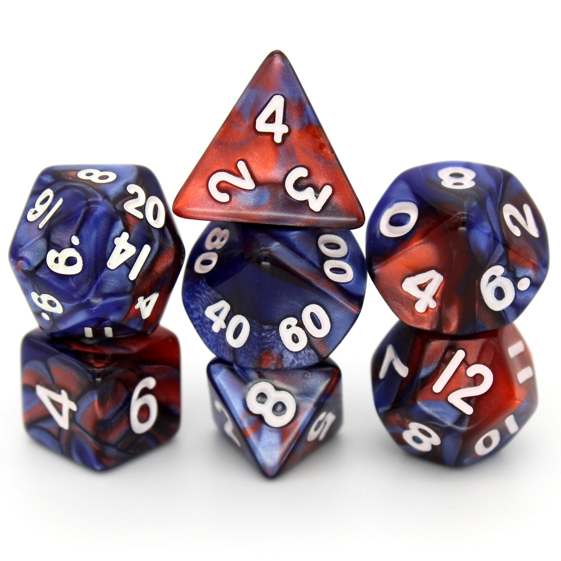 D'stracting is a 7-piece 13mm resin dice set with swirls of shimmery, pearlescent red and blue, with white ink. It belongs to our tiny but mighty Wee Lads collection.