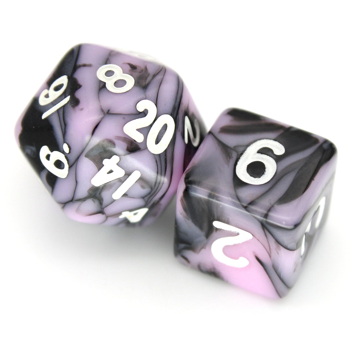 D'vas is a 7-piece 13mm resin dice set with swirls of black and pink, inked in white. It belongs to our tiny but mighty Wee Lads collection.