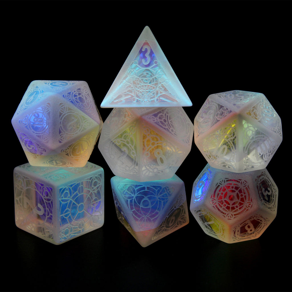 Elysium is a 7-piece rainbow crystal stone set with a frosted engraving of our exclusive Sigil design.