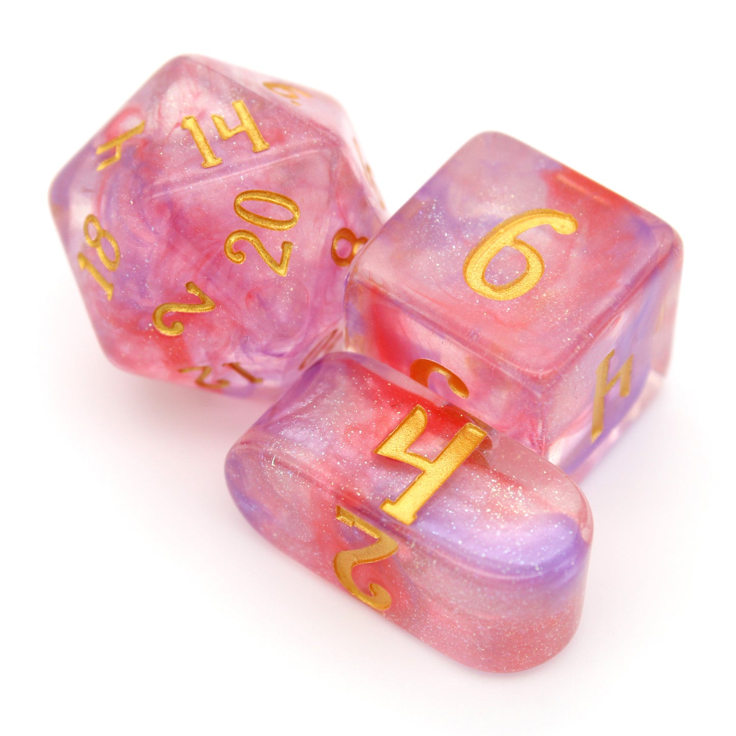 Fae Fight Club is a 10-piece resin set with swirls of pink, purple, and... is that blood? Inked in pixie-dust-gold.