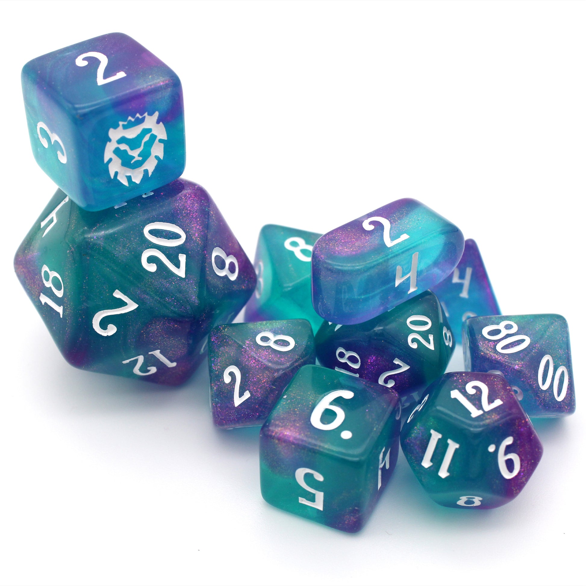 A 10 piece set of ocean teal resin dice with a splash of shimmering magenta and white ink.