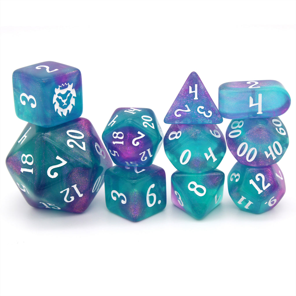 A 10 piece set of ocean teal resin dice with a splash of shimmering magenta and white ink.