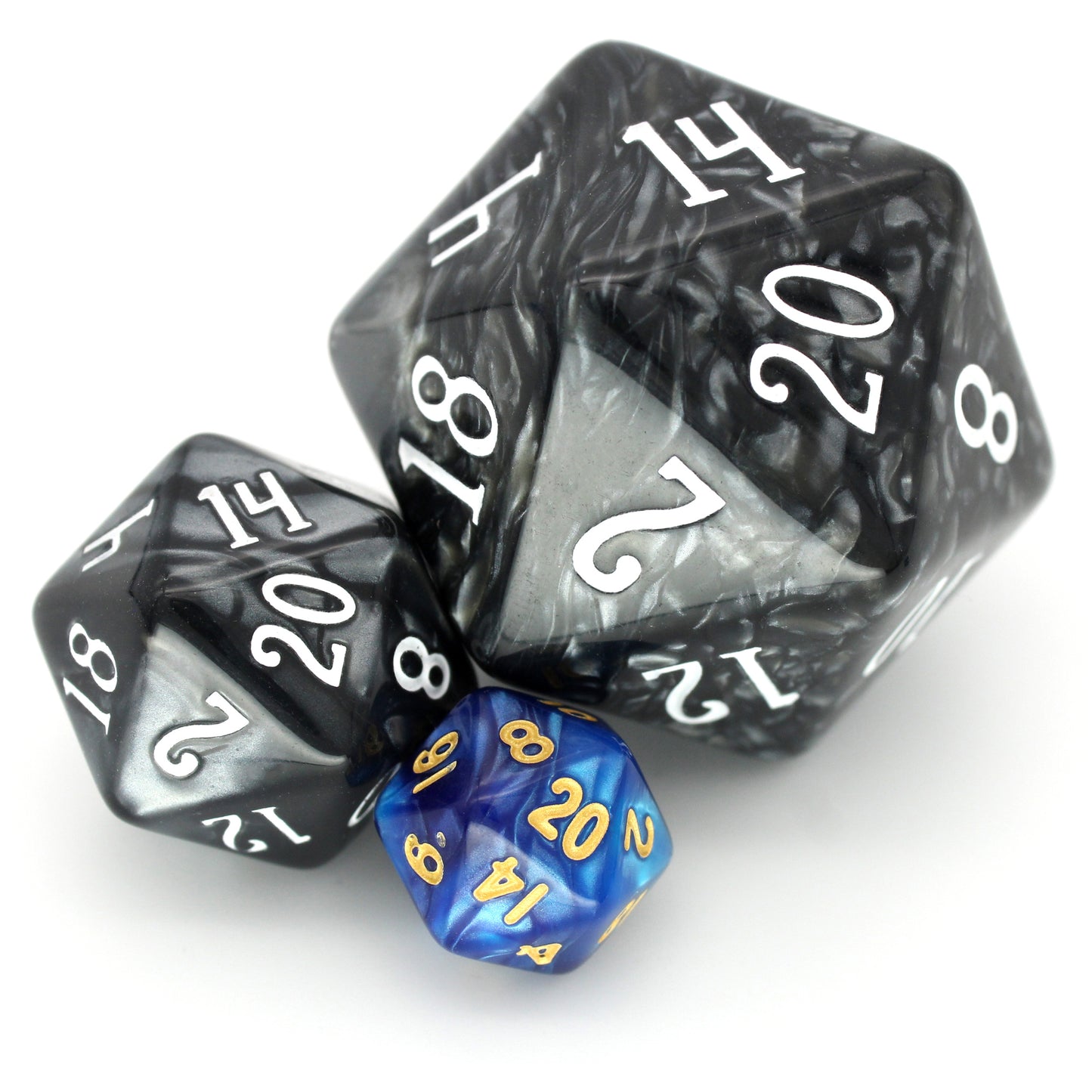 Mblue is a 7-piece 13mm resin dice set with shimmering waves of pearlescent blue, inked in pale gold. It belongs to our tiny but mighty Wee Lads collection.