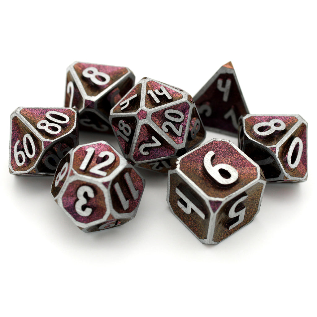 Oath of Glory is a Dice Envy Exclusive 7-piece set of silver, concave, metal dice with a metallic burgundy paint glaze. It is part of the Oathbound collection.