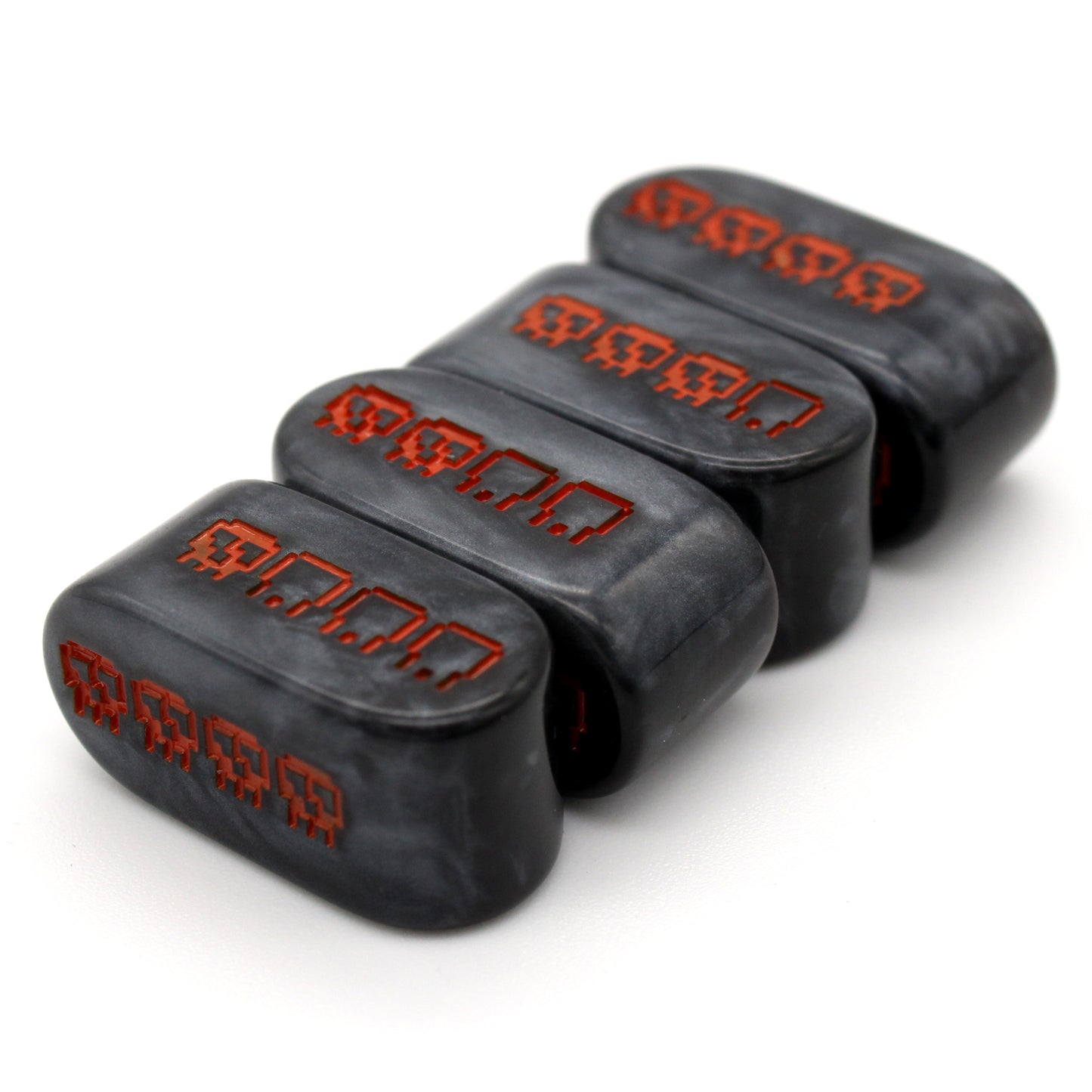 Pixel Skulls: Pumpkin Goth are custom black resin Infinity d4s inked in Halloween orange.