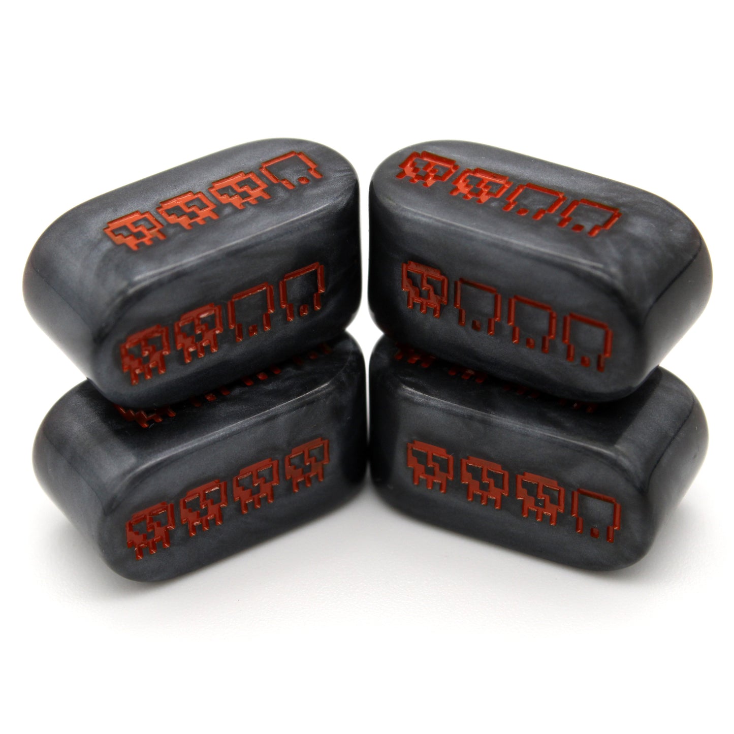 Pixel Skulls: Pumpkin Goth are custom black resin Infinity d4s inked in Halloween orange.