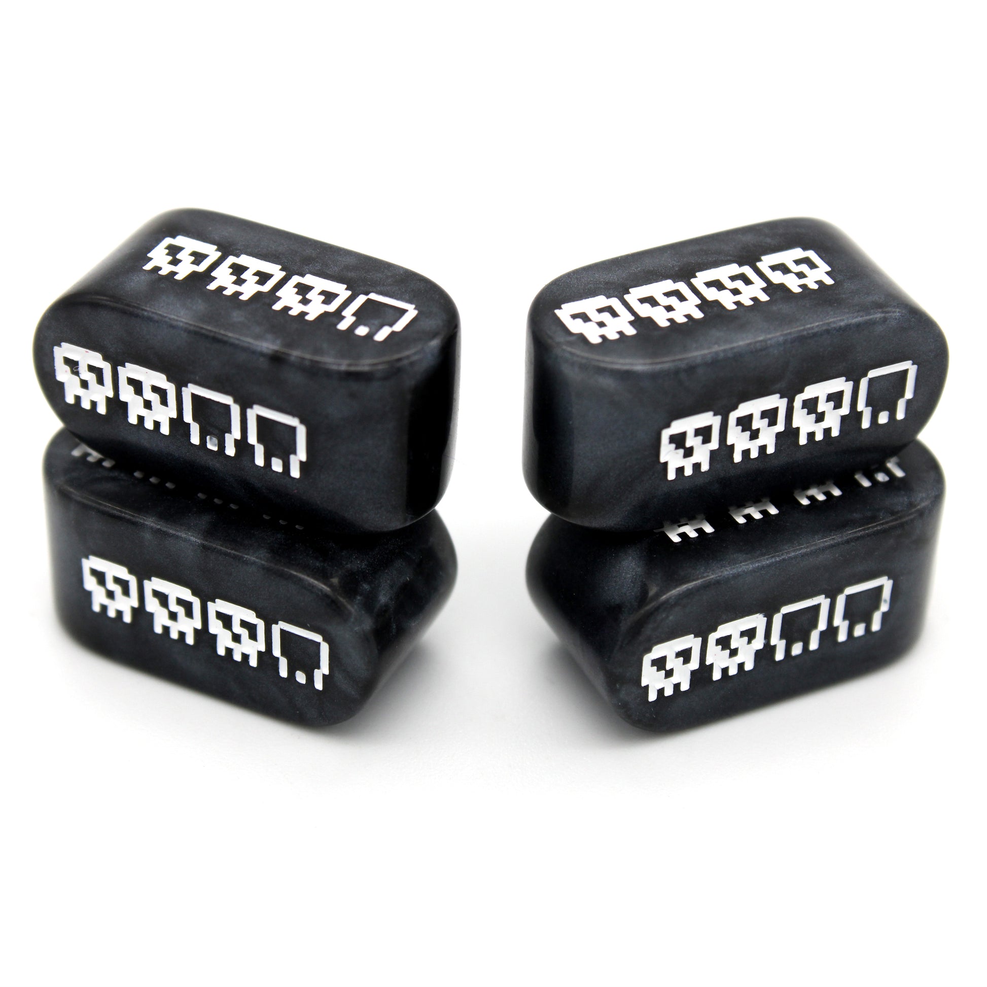 Pixel Skulls: Vanilla Goth are custom black resin Infinity d4s inked in bone white.