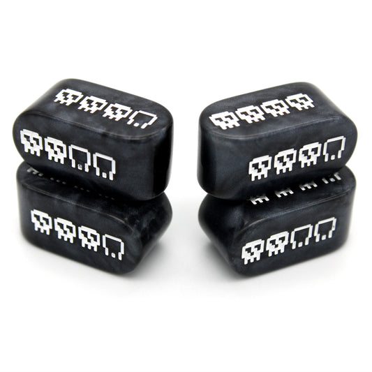 Pixel Skulls: Vanilla Goth are custom black resin Infinity d4s inked in bone white.
