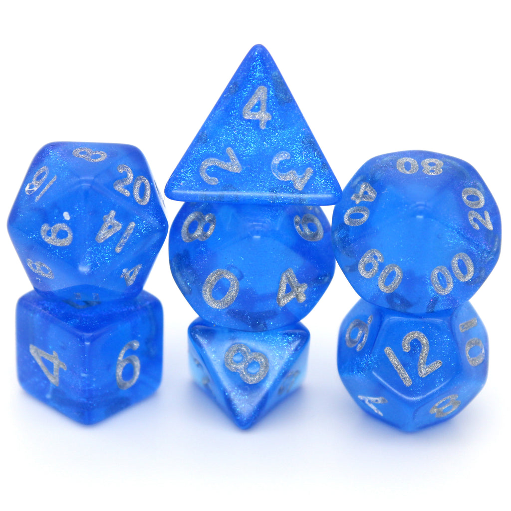 Sapphyre is a 7-piece 13mm semi-translucent glittery blue resin dice set, inked in silver. It belongs to our tiny but mighty Wee Lads collection.