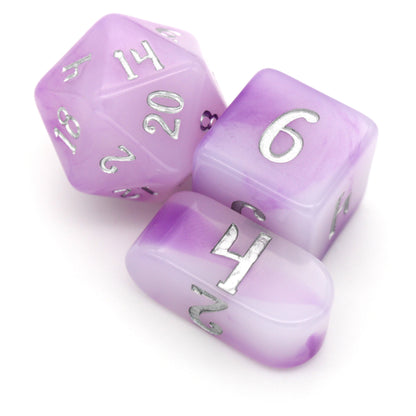 Taro Milk Tea is a 10-piece purple and white swirled resin dice set inked in silver.