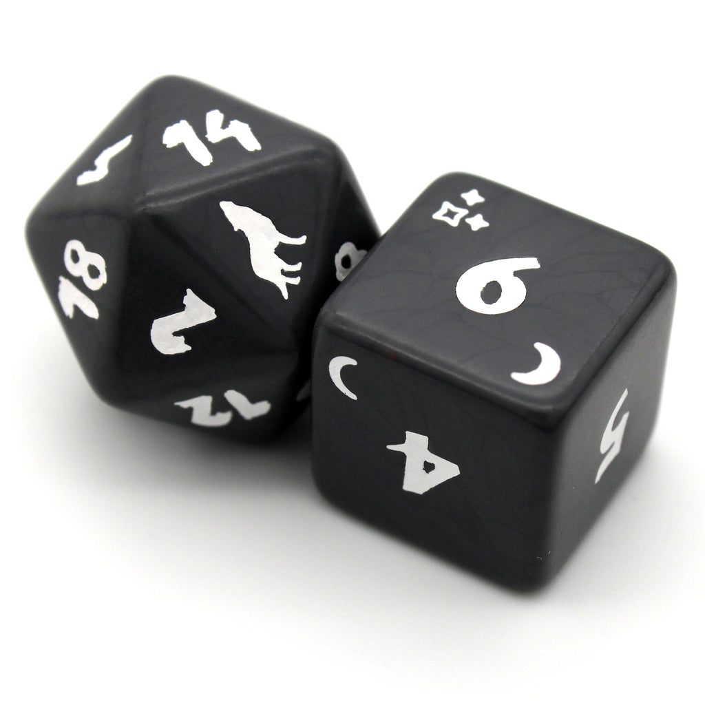 Dire is an 8-piece engraved acrylic set in midnight grey with wolf transformation icons inked in moonlit white. Included is an alternate d20 in reverse colors.